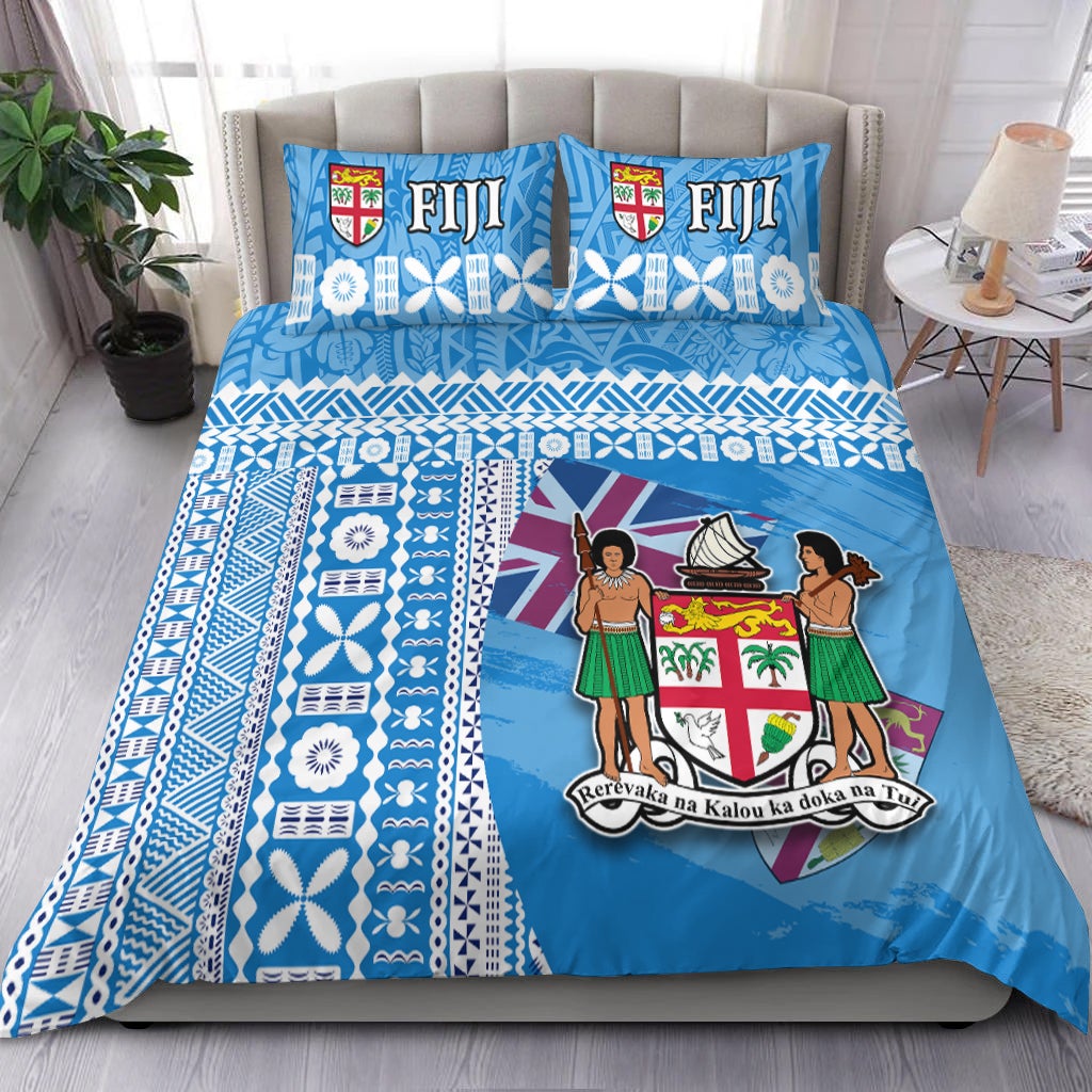 Blue Fiji-themed bedding set with patterned geometric blocks and illustrated shield