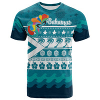 Teal tropical graphic T-shirt with Bahama title, mask, stars, palms, snowflakes