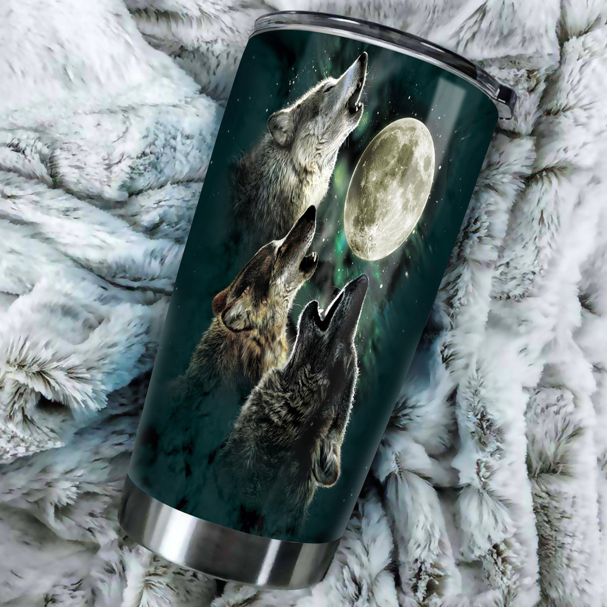20oz tumbler close-up: wolves and moon graphic on dark teal, silver rim and lid