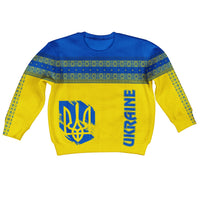 Kid knitted sweatshirt, yellow body with blue neckline and folk trim, graphic emblem front