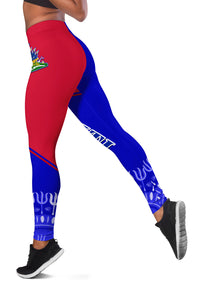 Full-length view of red and blue leggings with Haitian text and border stripe at calves