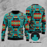 Multicolor Native American pattern sweater, teal base, ribbed cuffs and hem