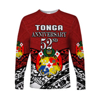 Red unisex long-sleeve shirt front view: Tonga Anniversary 52nd text and crest