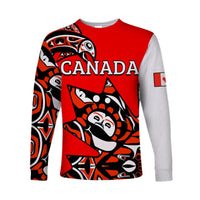 Red long sleeve shirt with Canada graphic and Indigenous-style bear print