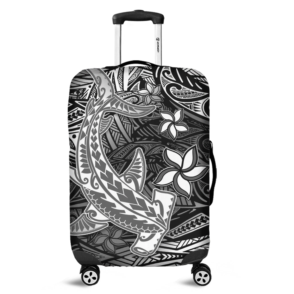 Black luggage cover with Polynesian tribal hammerhead shark and floral pattern, on wheels