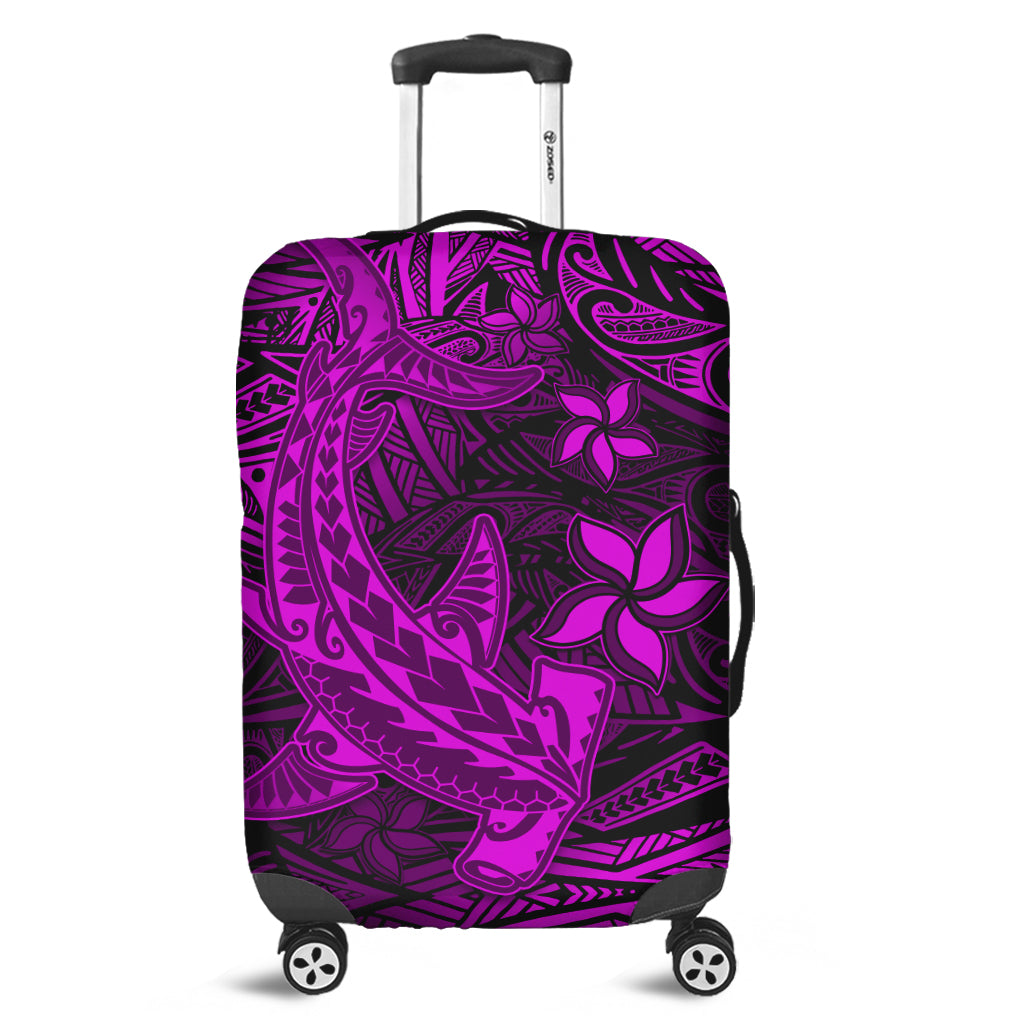 Suitcase cover with purple tribal pattern and hibiscus flowers, fitted over spinner luggage