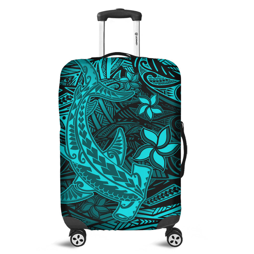 Turquoise suitcase luggage cover with teal tribal shark pattern and cutouts for wheels