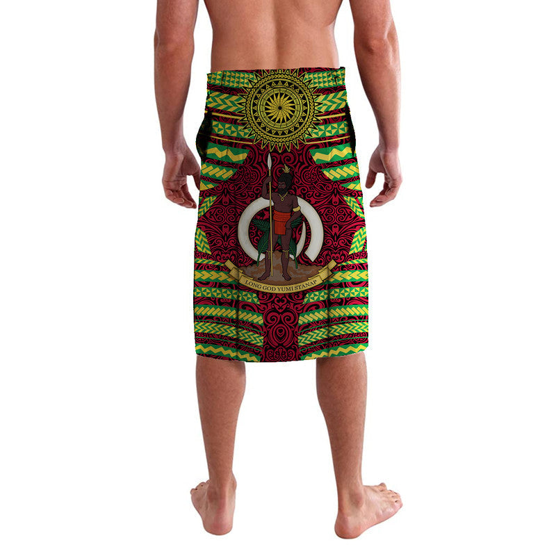 Red lavalava sarong with circular sunburst emblem, central figure, and green yellow trim