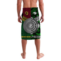 Green lavalava skirt with Maori-inspired spiral graphic and red accent panel