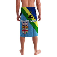 Blue lavalava with Malampa Fiji Day text and shield emblem, green and yellow diagonal accents