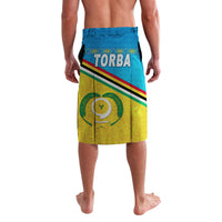 Blue lavalava skirt with TORBA print, green belt stripe, and yellow shield emblem