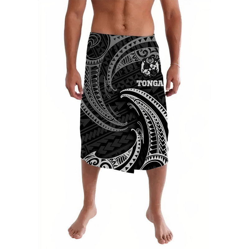 Lavalava sarong with black base and white tribal wave pattern, Tonga text center