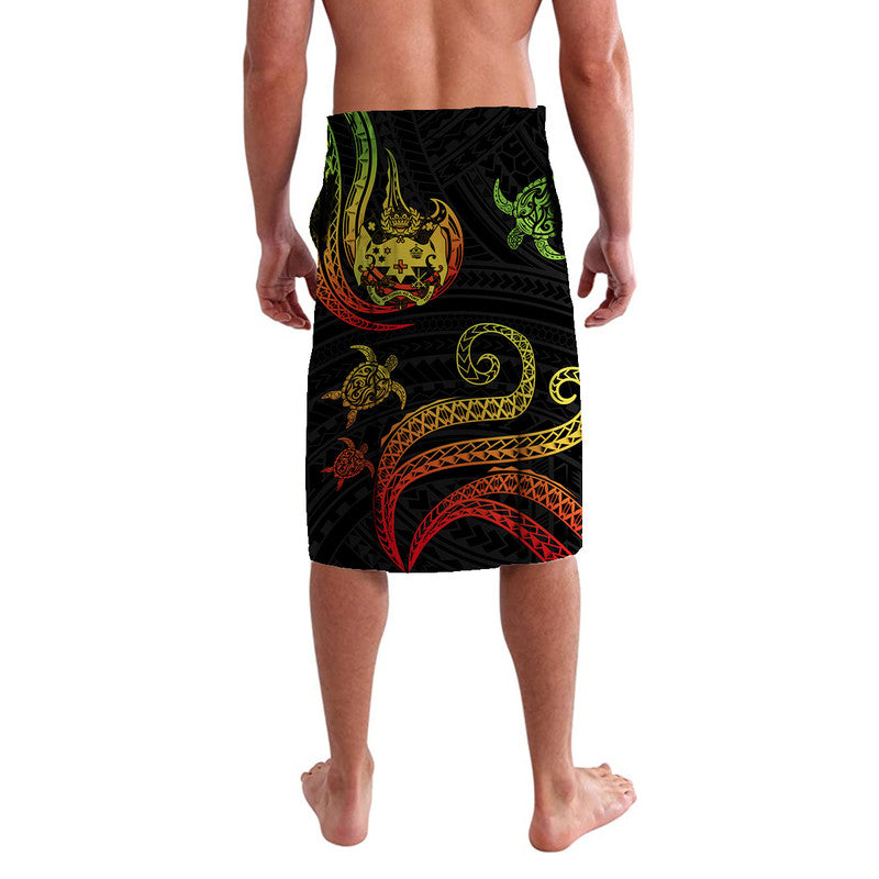Black lavalava sarong with large curved tribal graphics and turtle motif, green red yellow