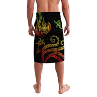 Black lavalava sarong with large curved tribal graphics and turtle motif, green red yellow
