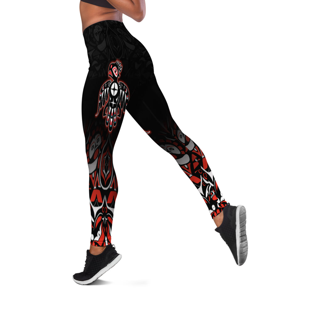 Black leggings with thunderbird graphic, side view