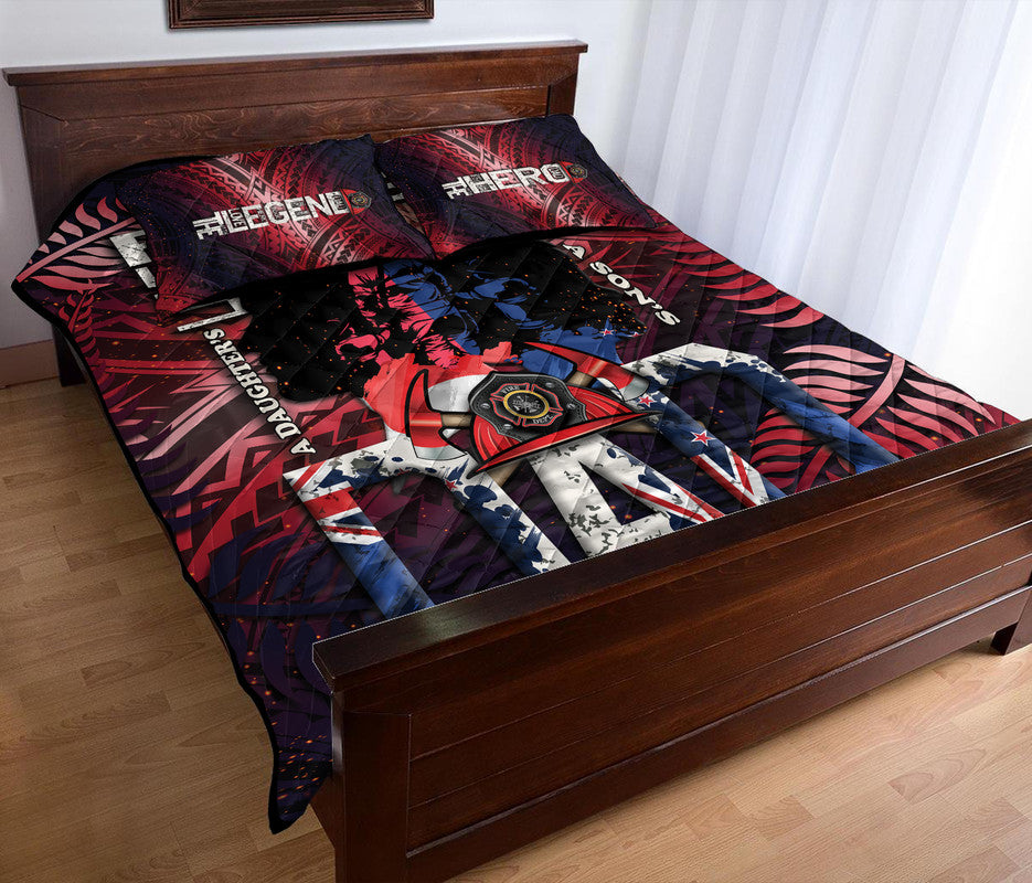 Red quilt bed set with two matching pillows; Maori pattern and firefighter-themed print