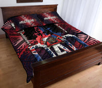 Red quilt bed set with two matching pillows; Maori pattern and firefighter-themed print