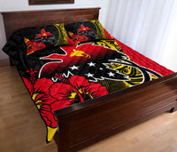 Black quilt bed set with red and white bird motifs and star accents