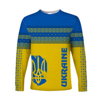 Yellow long-sleeve shirt with blue folk patterns, blue emblem and vertical text on front