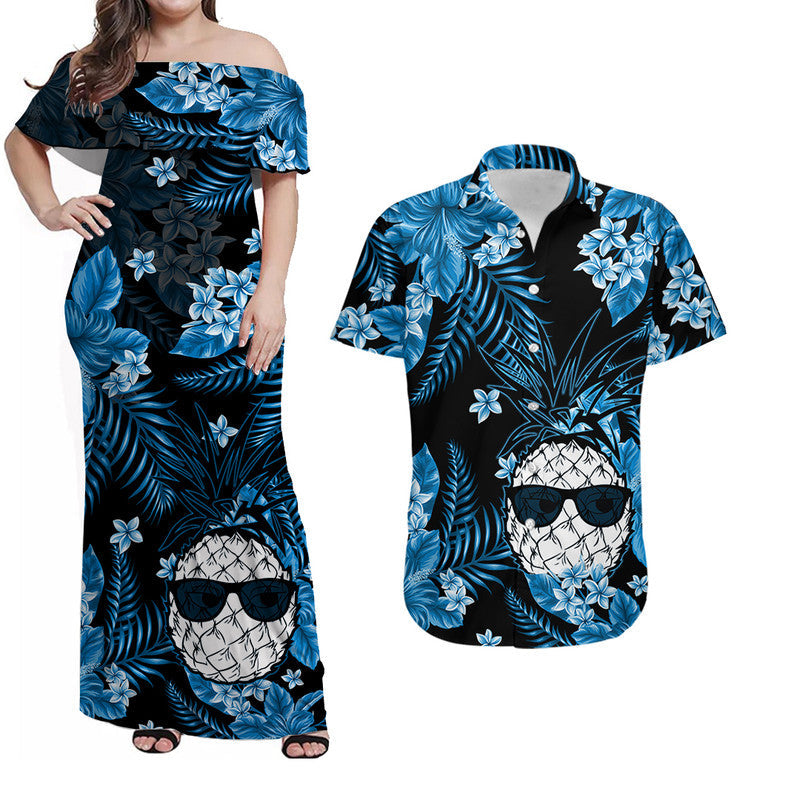 Off-shoulder maxi dress with blue tropical leaf and flower print, skull face graphic