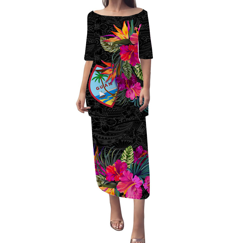 Black long pulletasi dress with off-shoulder boat neckline, floral hibiscus and leaf print