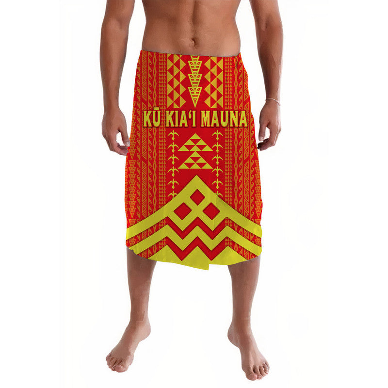 Red patterned lava lava sarong with green and yellow border, worn.