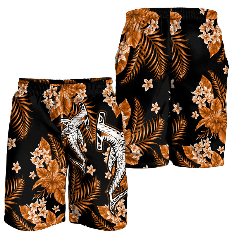 Men's tropical printed swim shorts, black with orange floral and leaf pattern, elastic waist