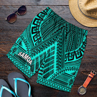 Men's tribal swim shorts in green with black geometric pattern