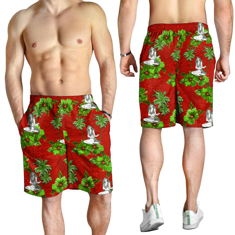 Men’s red tropical print shorts with white hula dancers and green palms, knee length