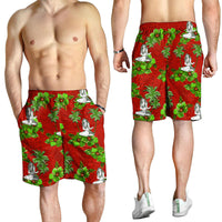 Men’s red tropical print shorts with white hula dancers and green palms, knee length