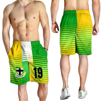 Men’s green and yellow striped athletic shorts with elastic waistband and number 19