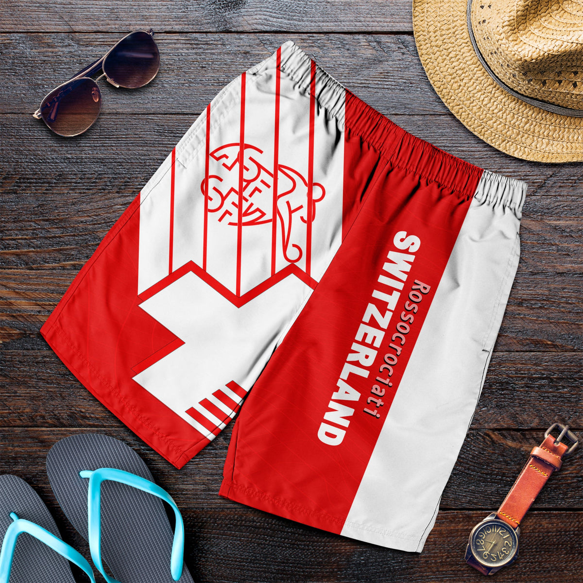 Red and white football-style shorts with Swiss flag graphic and bold text on side