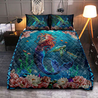 Full mermaid ocean quilt bed set with teal blue quilt, floral hem, and two decorative pillows