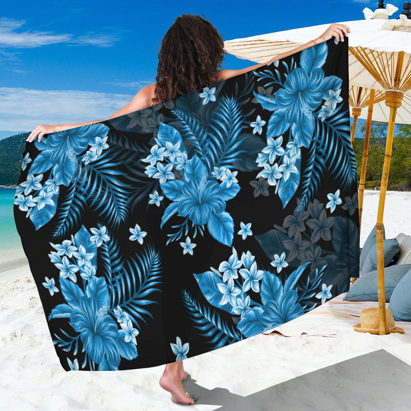 Blue floral tropical sarong with black base and leafy pattern