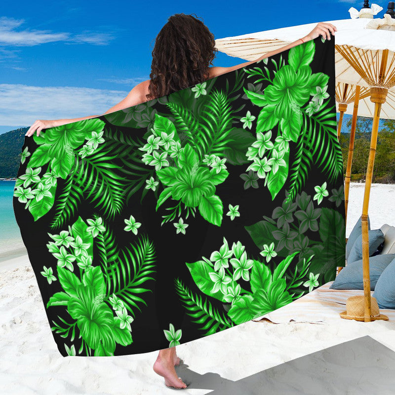 Green tropical floral sarong with leafy pattern, black background, rectangular cloth