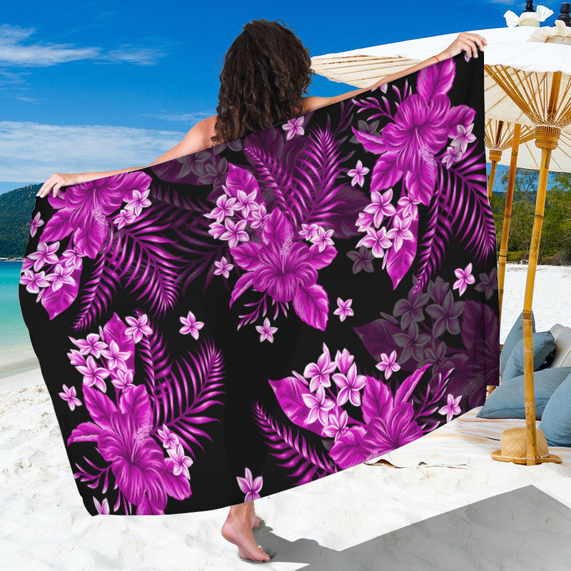 Purple floral tropical sarong with leaves on dark fabric, large rectangular wrap.