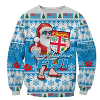 Blue Christmas sweatshirt with Santa holding Fiji flag and 'Merry Christmas FIJI' print