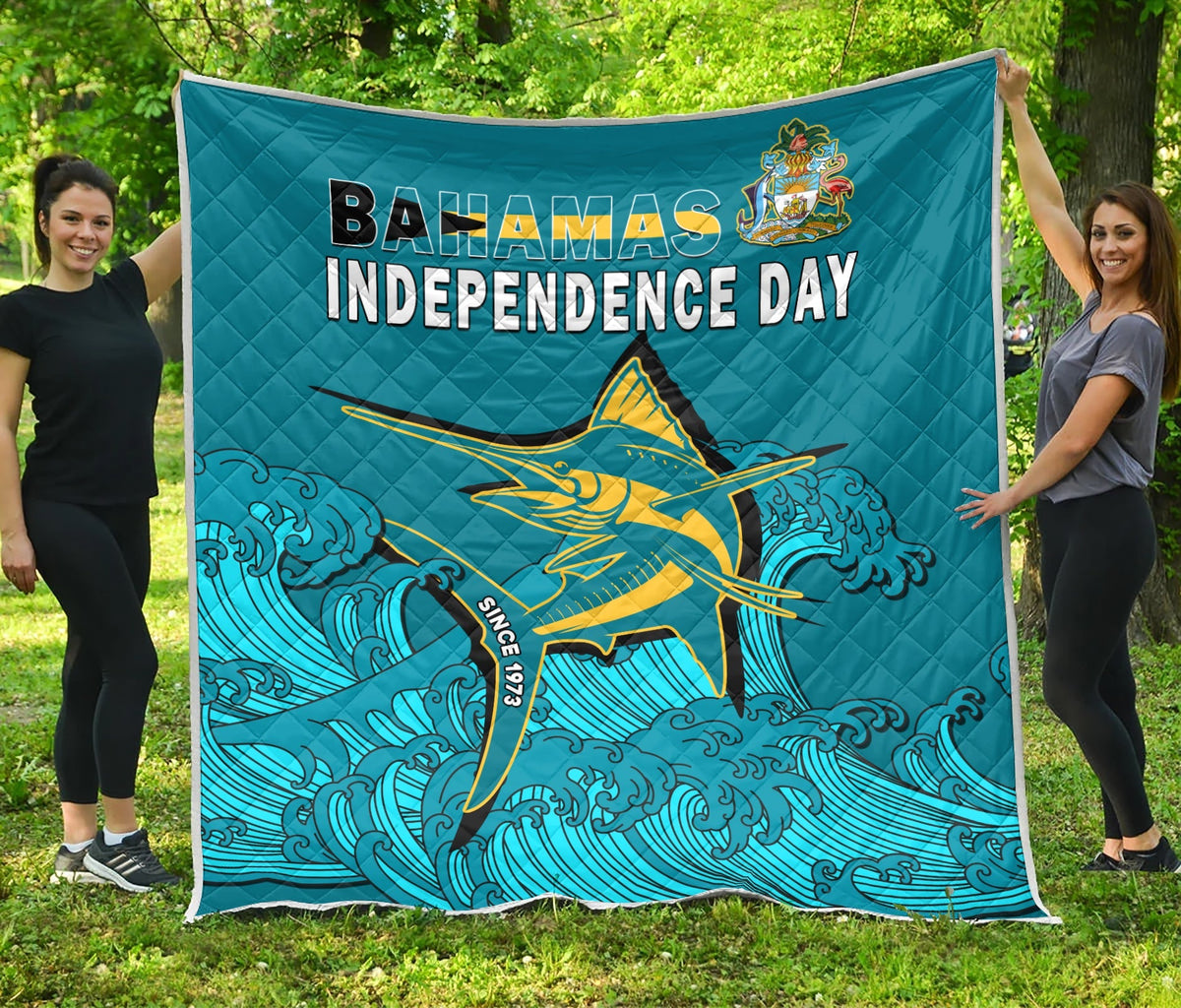 Bahamas Independence Day quilt in blue with marlin, ocean waves, and crest