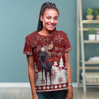Adult red Christmas T-shirt worn front: deer and birds graphic with “Merry Christmas”