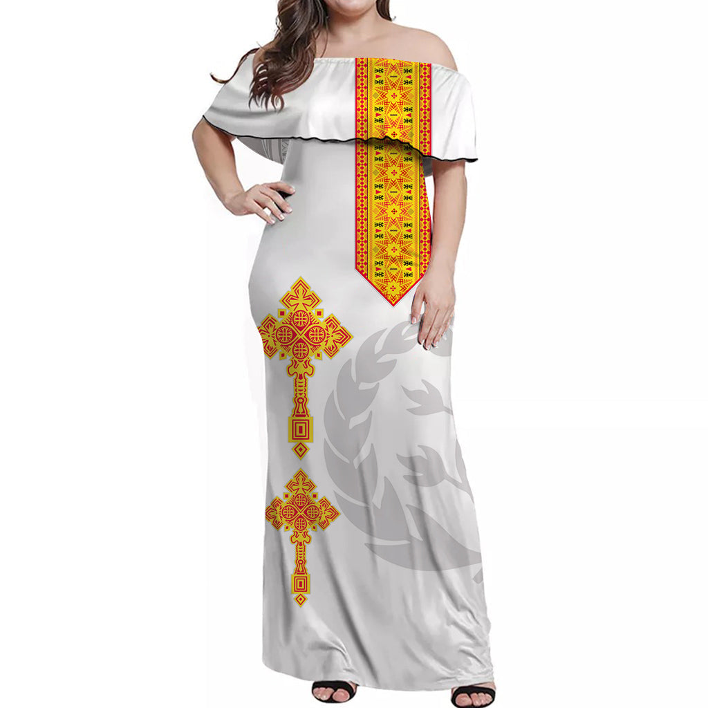 White off-shoulder long dress with red-and-gold vertical panel and cross motifs