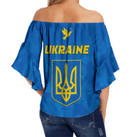 Blue off-shoulder top with elastic neckline and flared sleeves, back Ukraine trident emblem