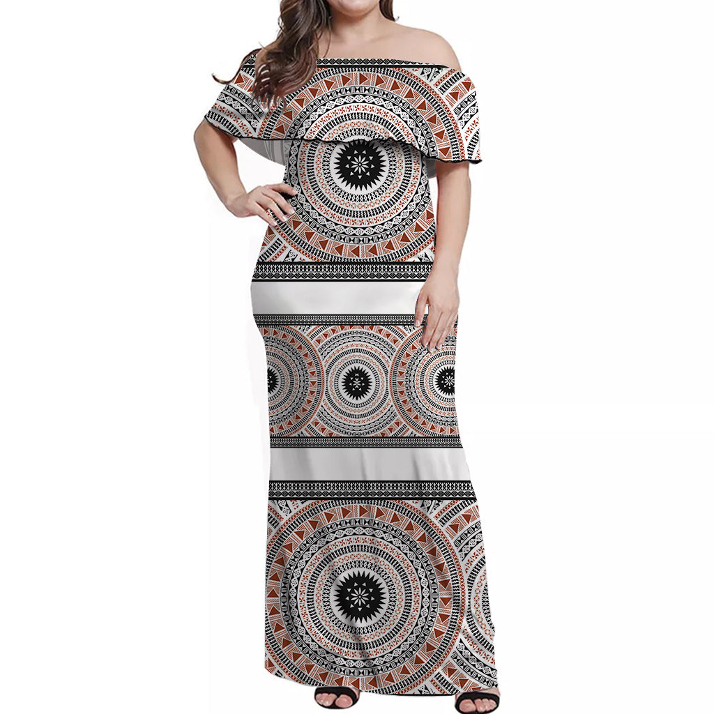Women’s off-shoulder long dress with circular tapa-style print, white base, orange and black
