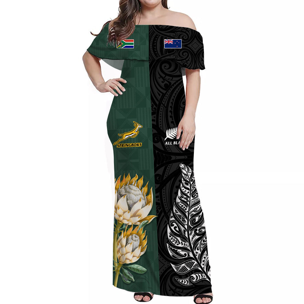 Off-shoulder long rugby dress in green and black with rugby emblems and floral print