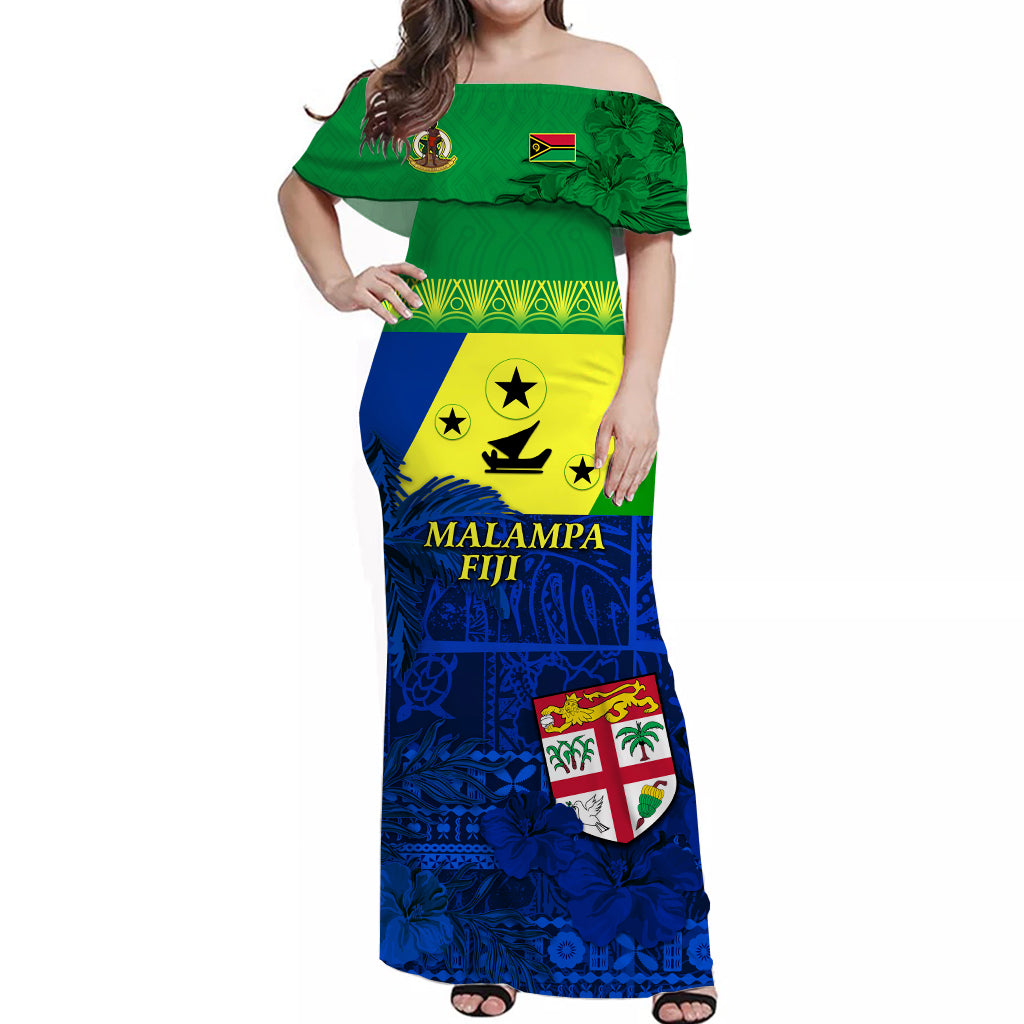 Green off-shoulder long dress with floral Polynesian print, blue hem and skirt