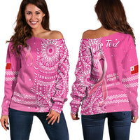 Pink off-shoulder sweater with Tongan pattern, breast cancer ribbon and text