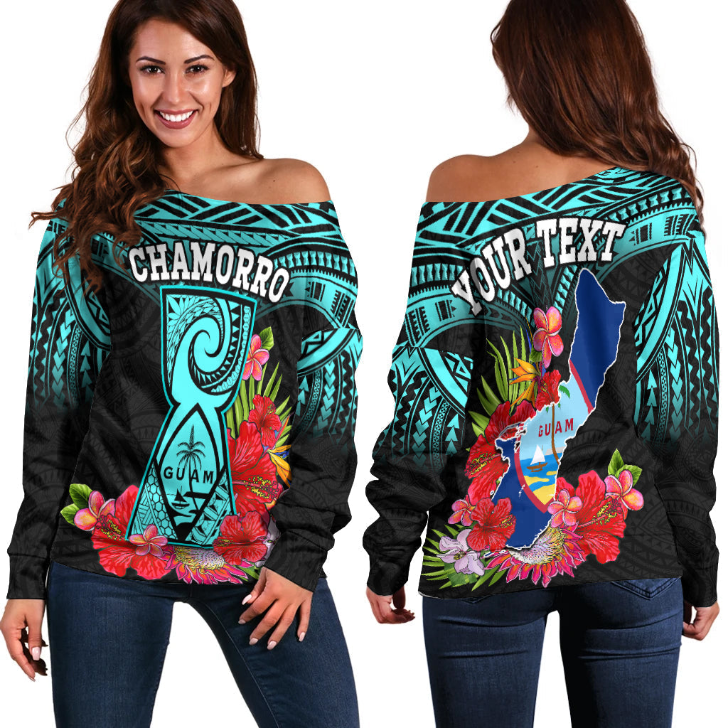 Off-shoulder sweater with turquoise tribal print and colorful floral graphics on black