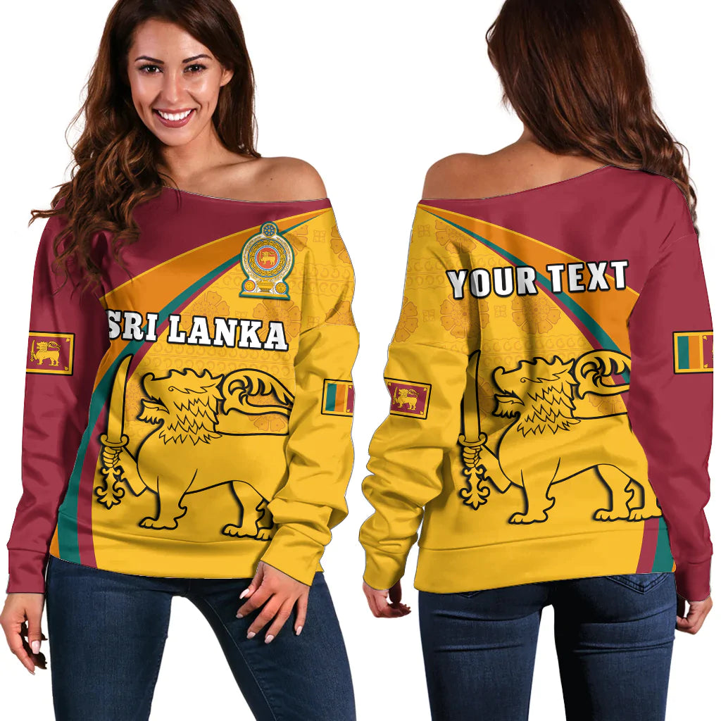 Red off-shoulder sweater with yellow Sri Lanka graphic, lion crest, long sleeves