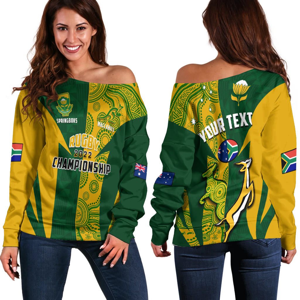 Women’s off-shoulder rugby sweater in green and yellow with colorful graphic print