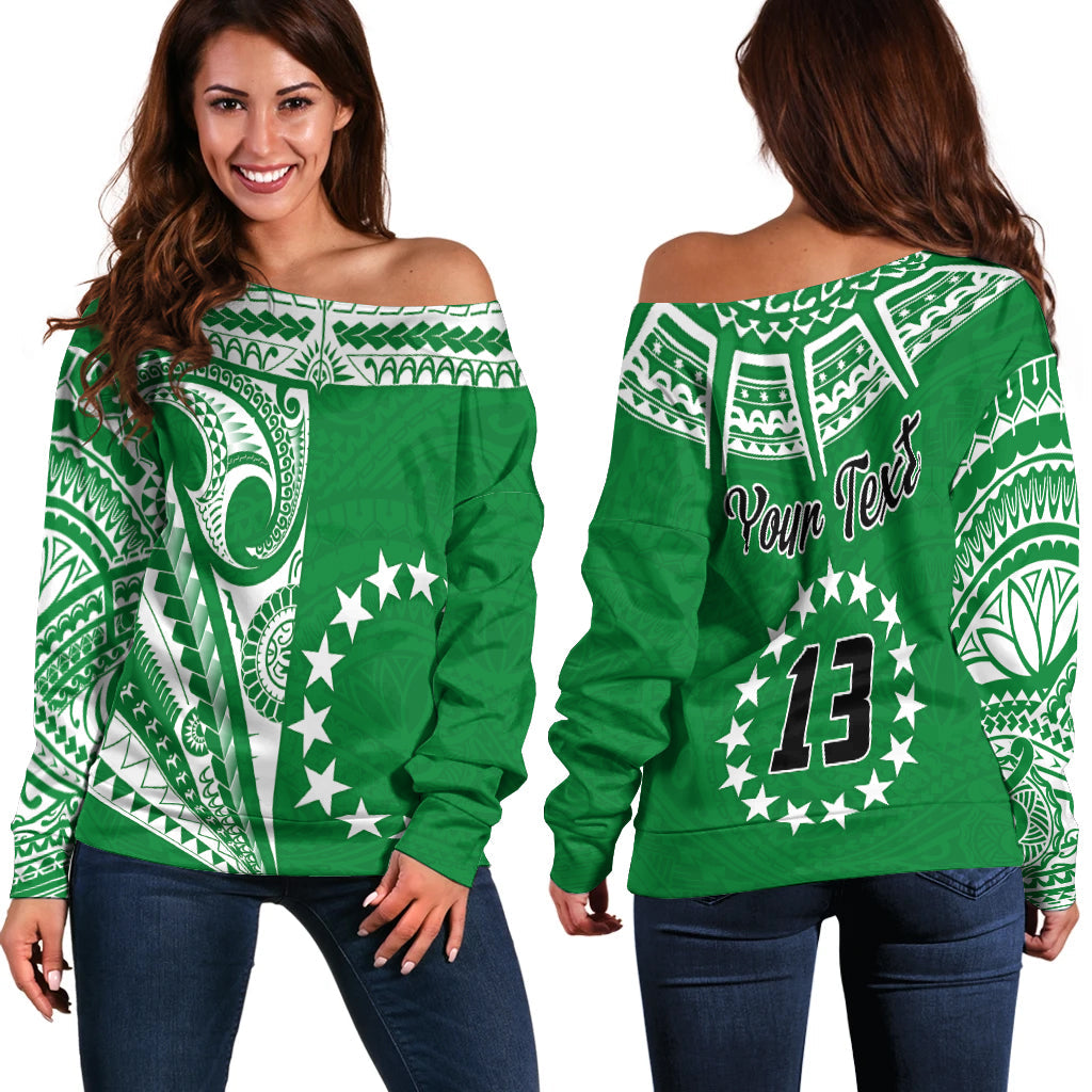 Green off-shoulder sweater with tribal print, stars and No. 13 on front