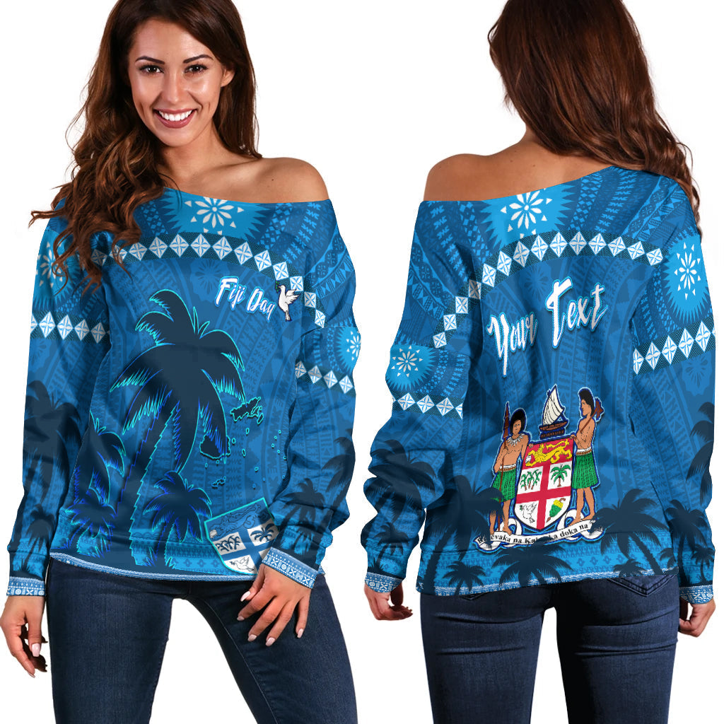 Women’s blue off-shoulder sweater with palm tree and geometric Fijian tapa print